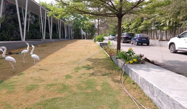 Lush green walkways and pedestrian-friendly office spaces at the IRA Builder premises located a short drive from Prestige Golden Grove