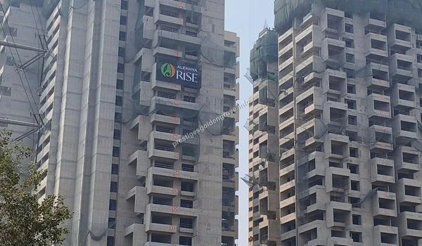 Close-up view of Alekhya Rise high-rise residential towers under construction in the vicinity of Prestige Golden Grove