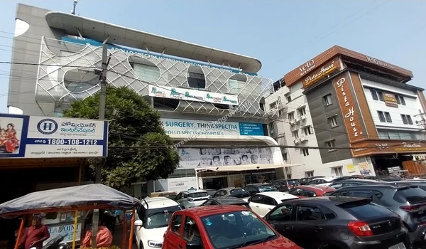 The modern facade of Apollo Spectra Hospitals in Kondapur offering specialized medical services within a short drive from Prestige Golden Grove