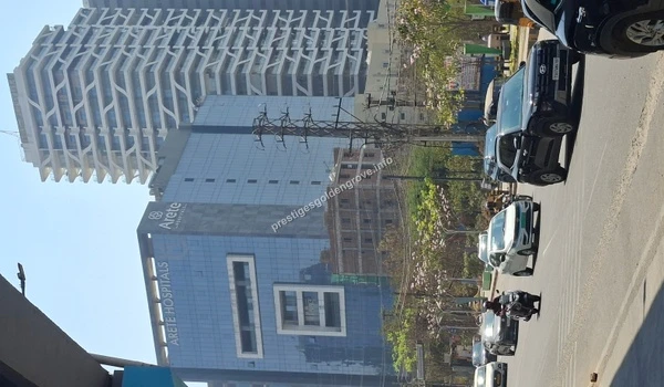 The state-of-the-art Arete Hospitals building set against modern high-rise architecture, ensuring world-class healthcare is within reach for Prestige Golden Grove