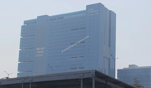 The exterior of GAR Infobahn Tower 06 housing major tech companies in the commercial corridor near Prestige Golden Grove