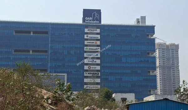 View of the prominent GAR Infobahn IT park featuring major corporate offices like Amazon and Capgemini, located in close proximity to the Prestige Golden Grove project site