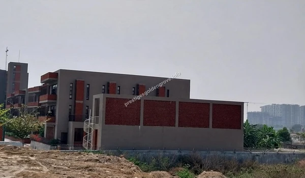 View of the state-of-the-art auditorium and sports complex at Gaudium School providing world-class education near Prestige Golden Grove