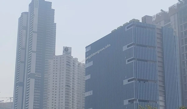 A wide view of the bustling IT tech park and corporate skyscrapers surrounding the Prestige Golden Grove project