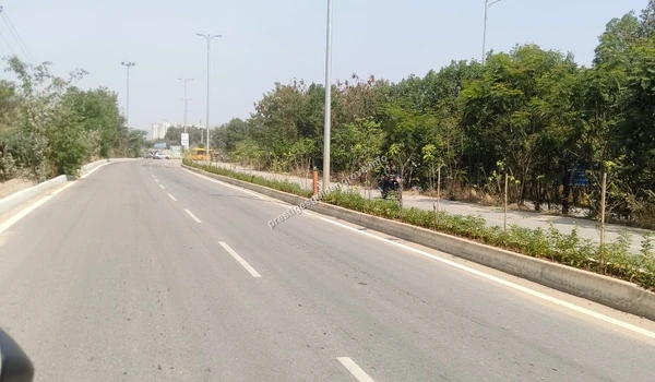 Exploring the well-developed arterial roads on March 03 , 2026, demonstrating the superior urban planning and seamless transit from Nehru Outer Ring Road towards the Prestige Golden Grove development.