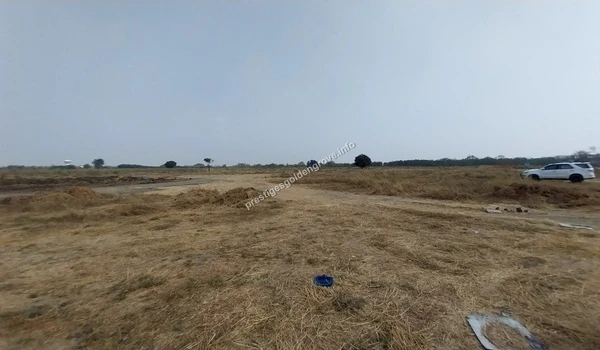 Wide panoramic view of the open land and site landscape at Prestige Golden Grove in Hyderabad