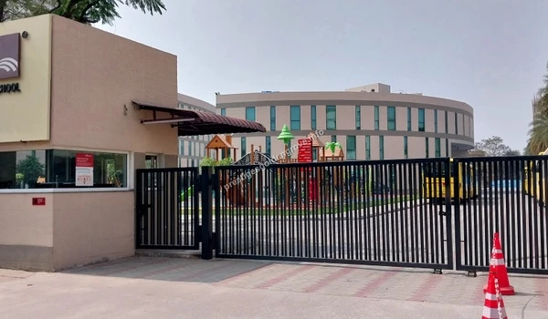 Exterior view of a modern school facility in Lingampalli showcasing the excellent educational infrastructure available to Prestige Golden Grove residents