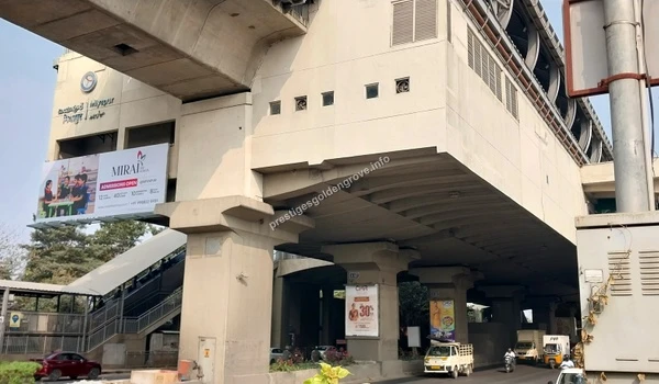 Wide angle view of the Miyapur Metro Station pillars and surrounding transit area serving the Prestige Golden Grove community