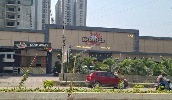 Exterior view of the K-Grill restaurant in Tellapur, showcasing the vibrant local dining and culinary options available close to the Prestige Golden Grove community