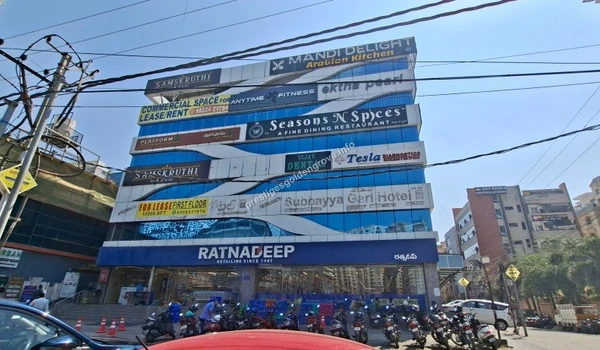 Street view of local shopping centers including essential supermarkets and restaurants, showcasing the highly developed neighborhood around Prestige Golden Grove