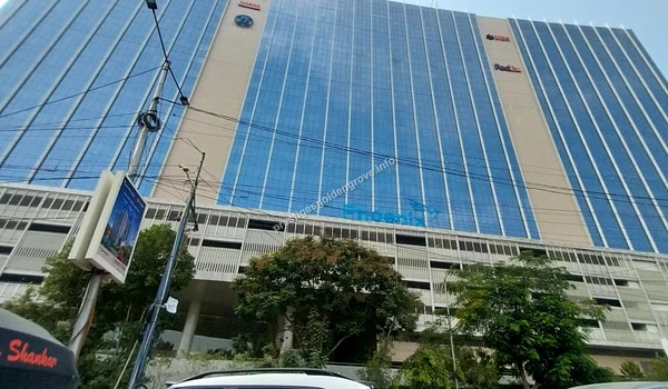 Low angle view of the Phoenix Avance SEZ building housing global companies like FedEx near Prestige Golden Grove