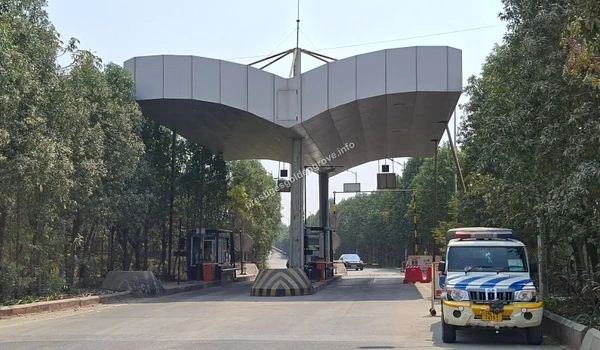 View of the well-maintained toll plaza and security checkpost near Tellapur, ensuring safe, secure, and smooth road connectivity for residents of Prestige Golden Grove