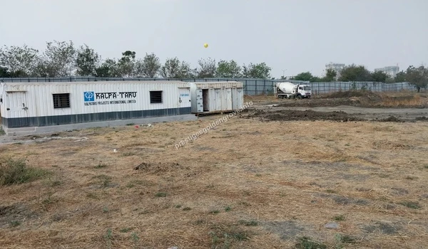 Temporary site facilities and engineering cabins positioned on the dry tract of land at the Prestige Golden Grove location
