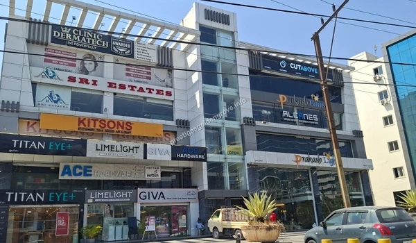 Close-up view of the commercial building housing Ace Hardware and various lifestyle boutiques, perfect for the daily shopping needs of Prestige Golden Grove residents