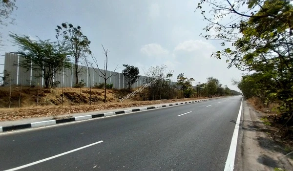 Wide road view showing the seamless access to Prestige Golden Grove and the surrounding Prestige Kollur development area